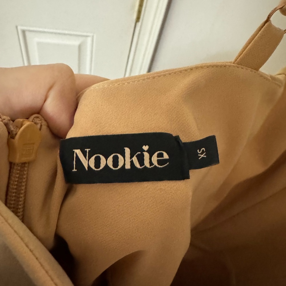 Nookie, worn twice, small stain, comes with belt